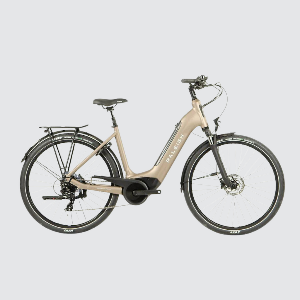 raleigh motus tour low step hybrid electric ebike champagne