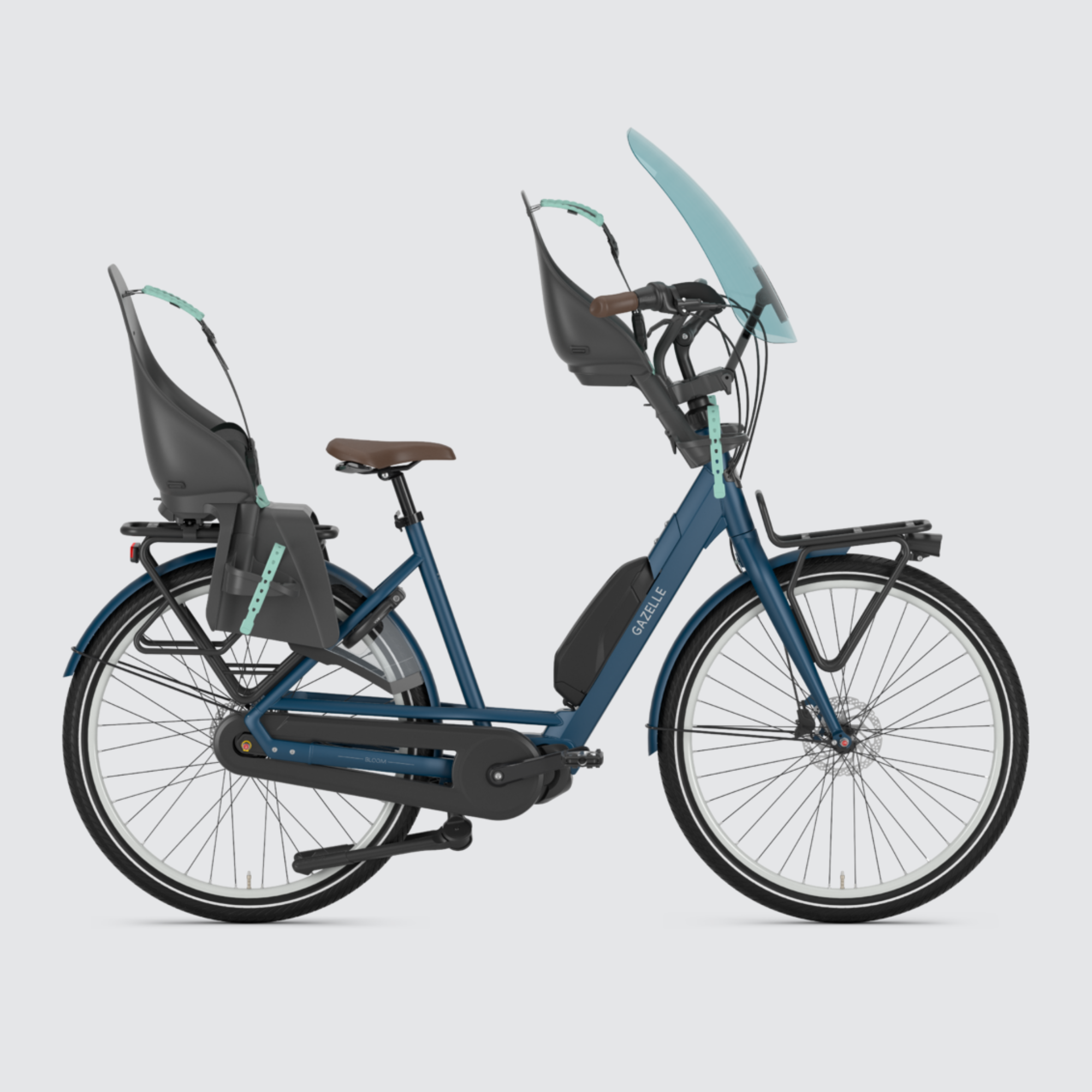Discover the versatility of the Gazelle Bloom C7 HMS in mallard blue – designed for family joy and comfort on every ride. Bicycle shown with child seats in front and rear position with screen at the front. Child sseats and screen not included and must be purchased separately.