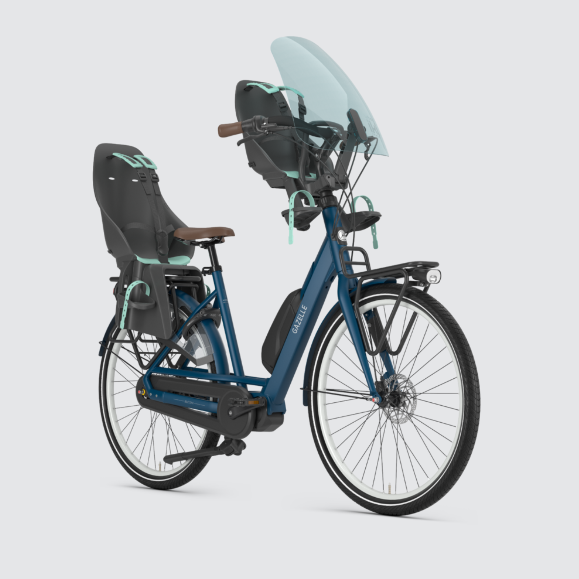 Explore the spacious design and stability of the Gazelle Bloom C7 HMS in mallard blue – your ideal family-friendly electric bike. Bicycle shown with child seats in front and rear position with screen at the front. Child sseats and screen not included and must be purchased separately.