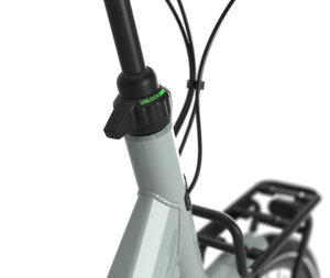 Bloom C7 HMS steering lock prevents handles from turning when loading up bike. Shown on light olive model.