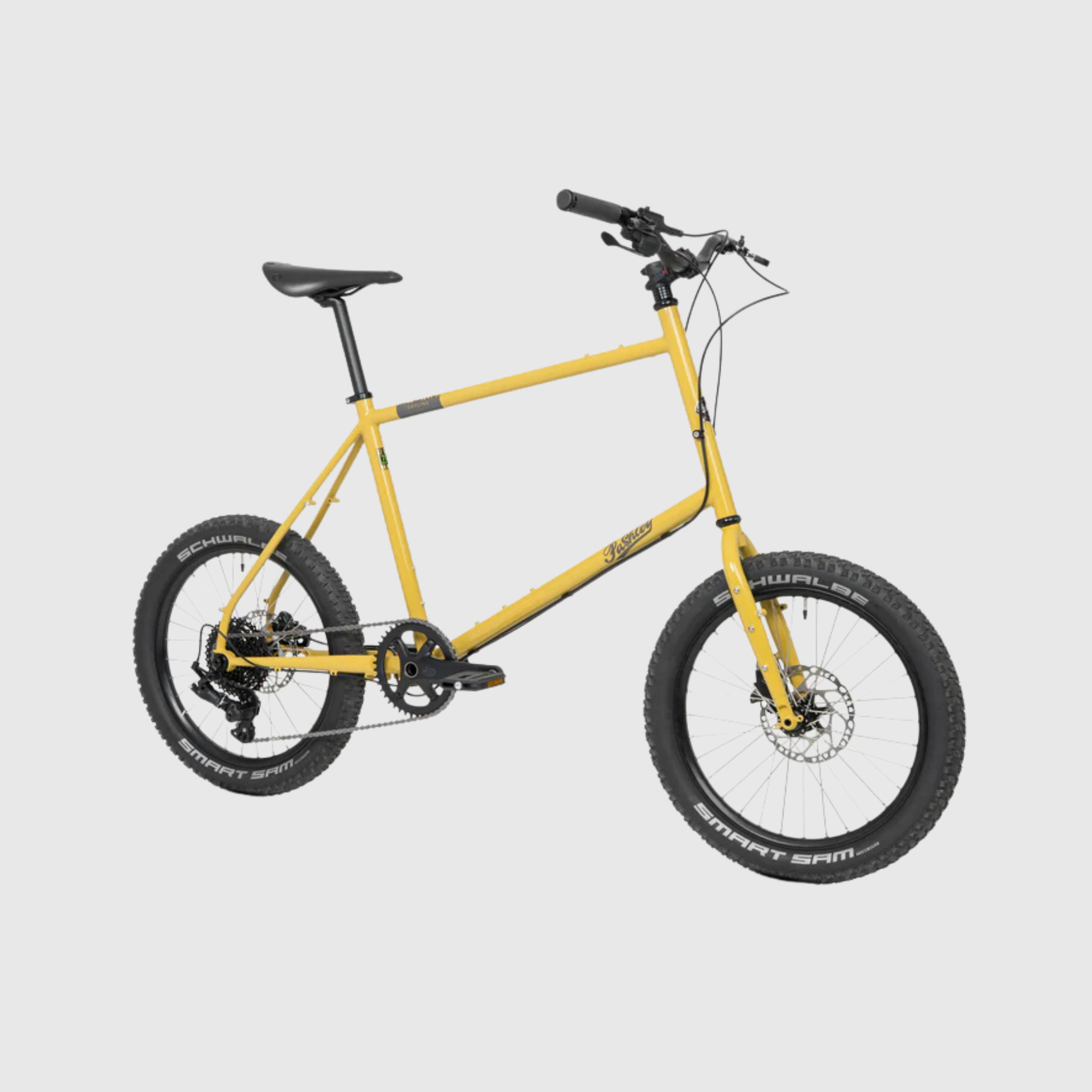 Yellow bicycle on a light gray background